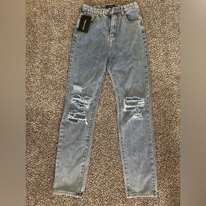 Pretty Little Thing brand new jeans. Never worn. Size small